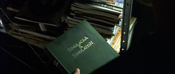 '매트릭스'에 등장하는 보드리야르의 책.